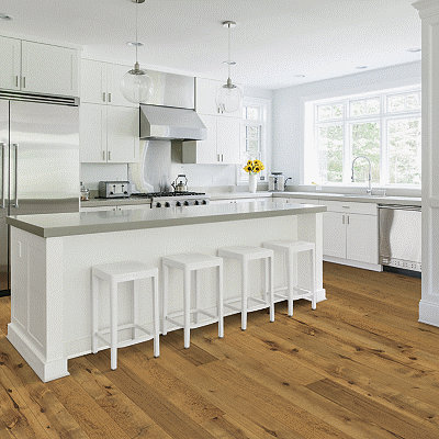 white kitchen with warm, textured hardwood floors