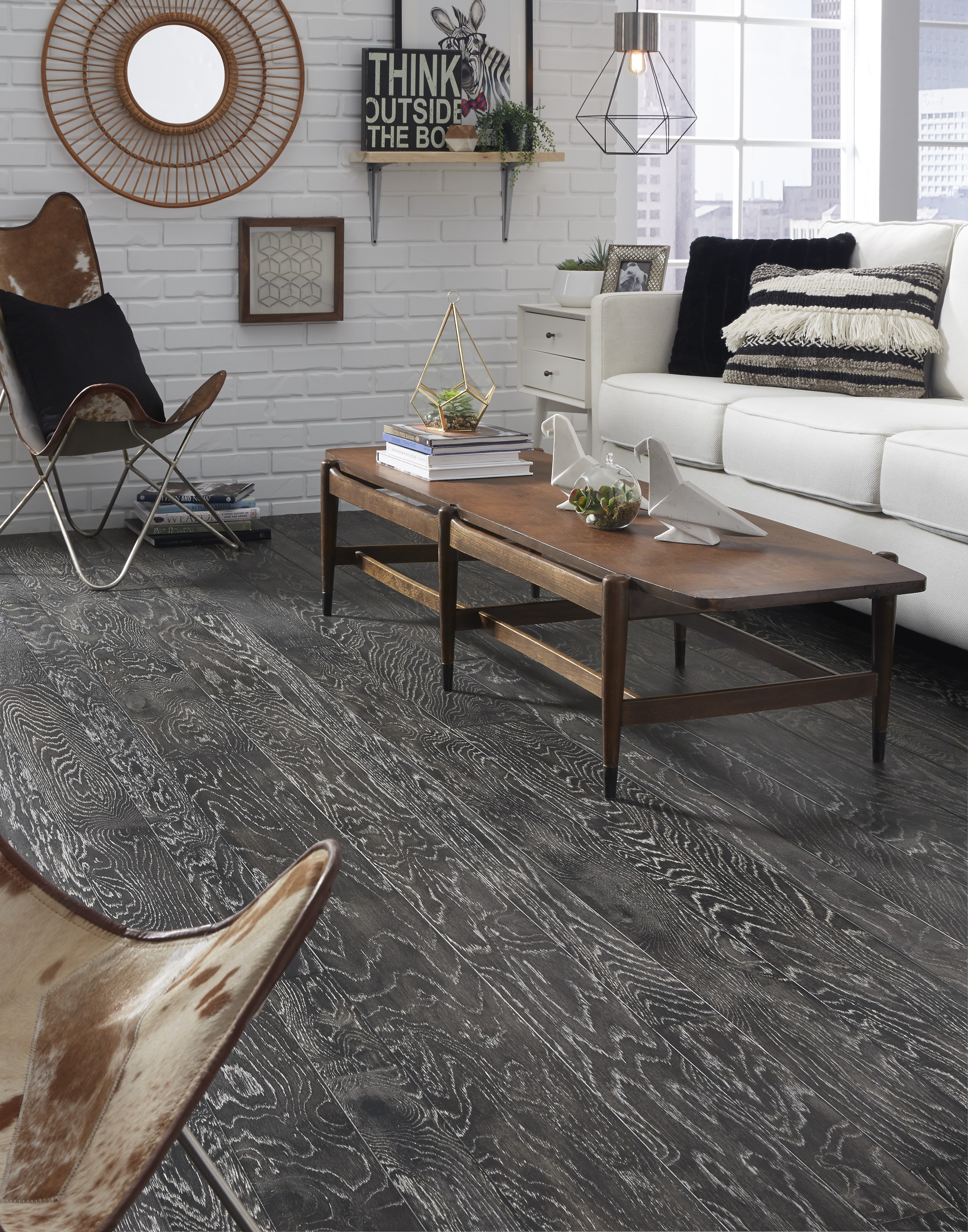 Dark gray hardwood flooring in a living room
